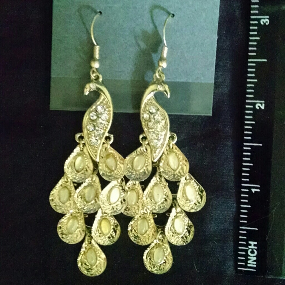 Beautiful gold peacock fancy earrings